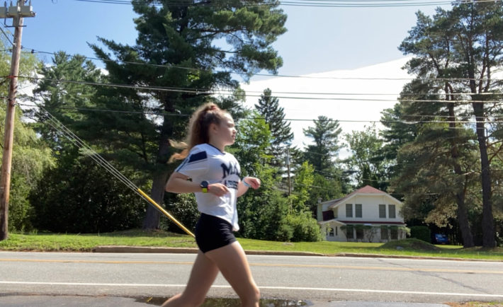 Person running on neighborhood street