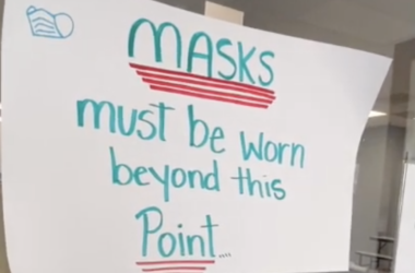 Sign saying that masks must be worn at all times